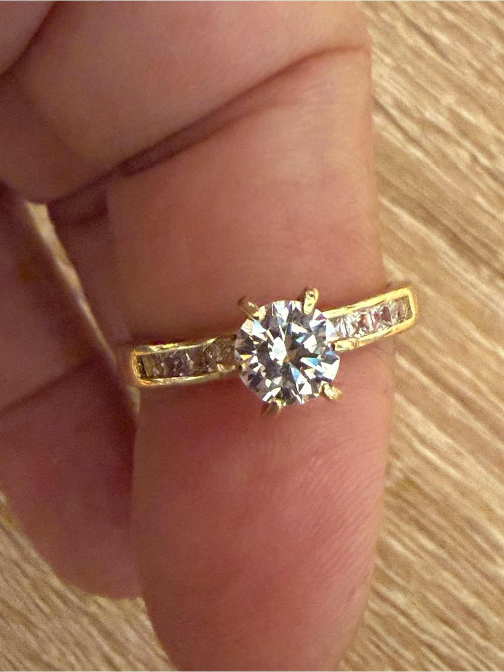 Gold Solitaire Engagement Ring with Clear Center Stone